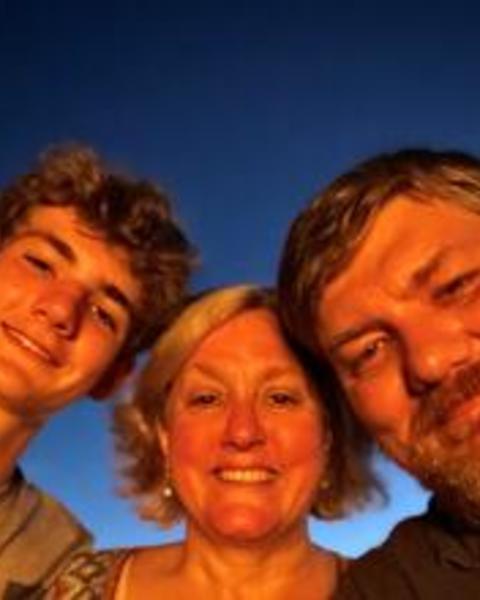 picture of faculty deans with their son